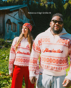 Almdudler x Strawanza Strickpullover